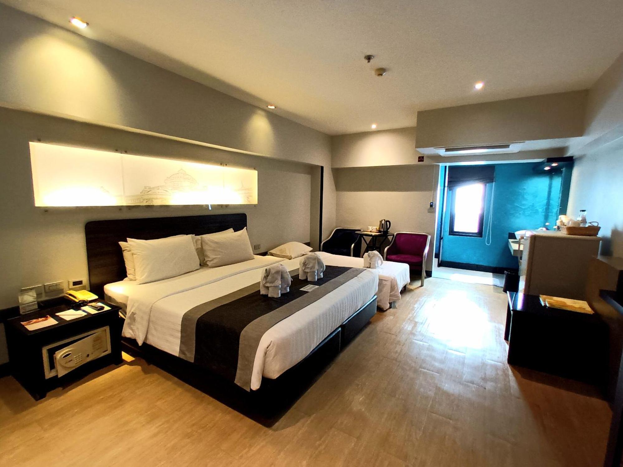 Nouvo City Hotel Бангкок Номер фото