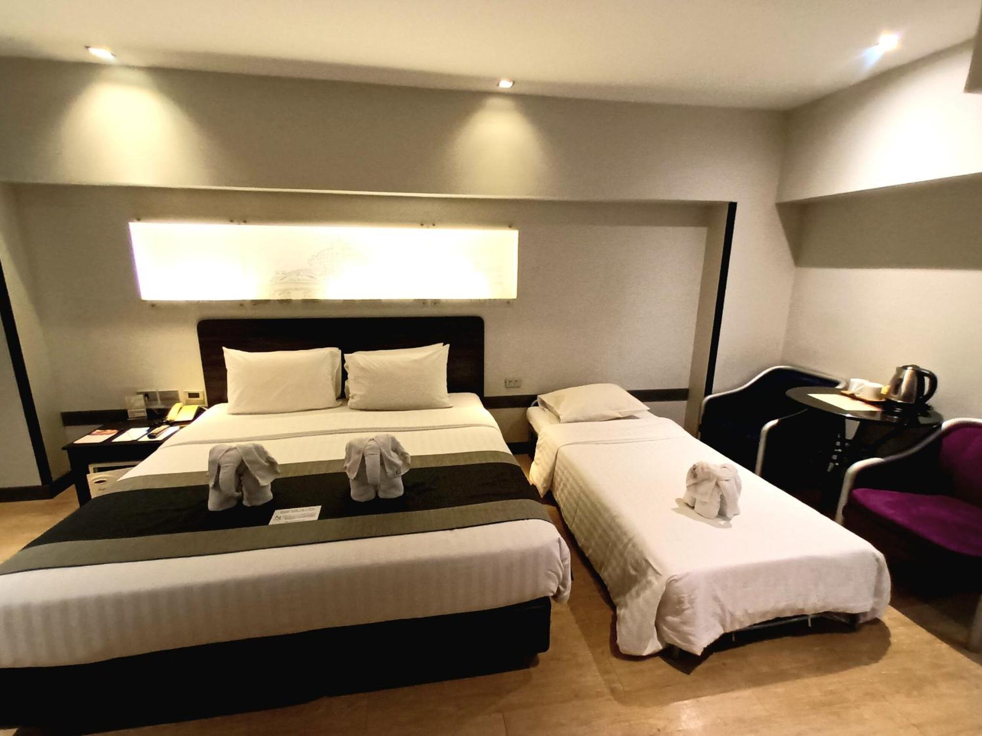 Nouvo City Hotel Бангкок Номер фото